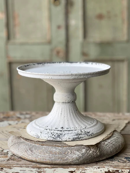 Cream metal pedestal
